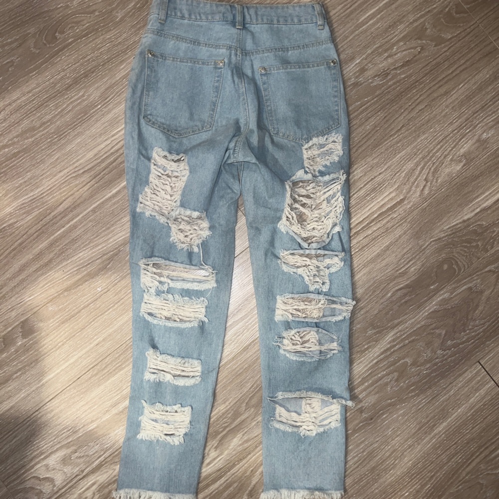 Very ripped jeans